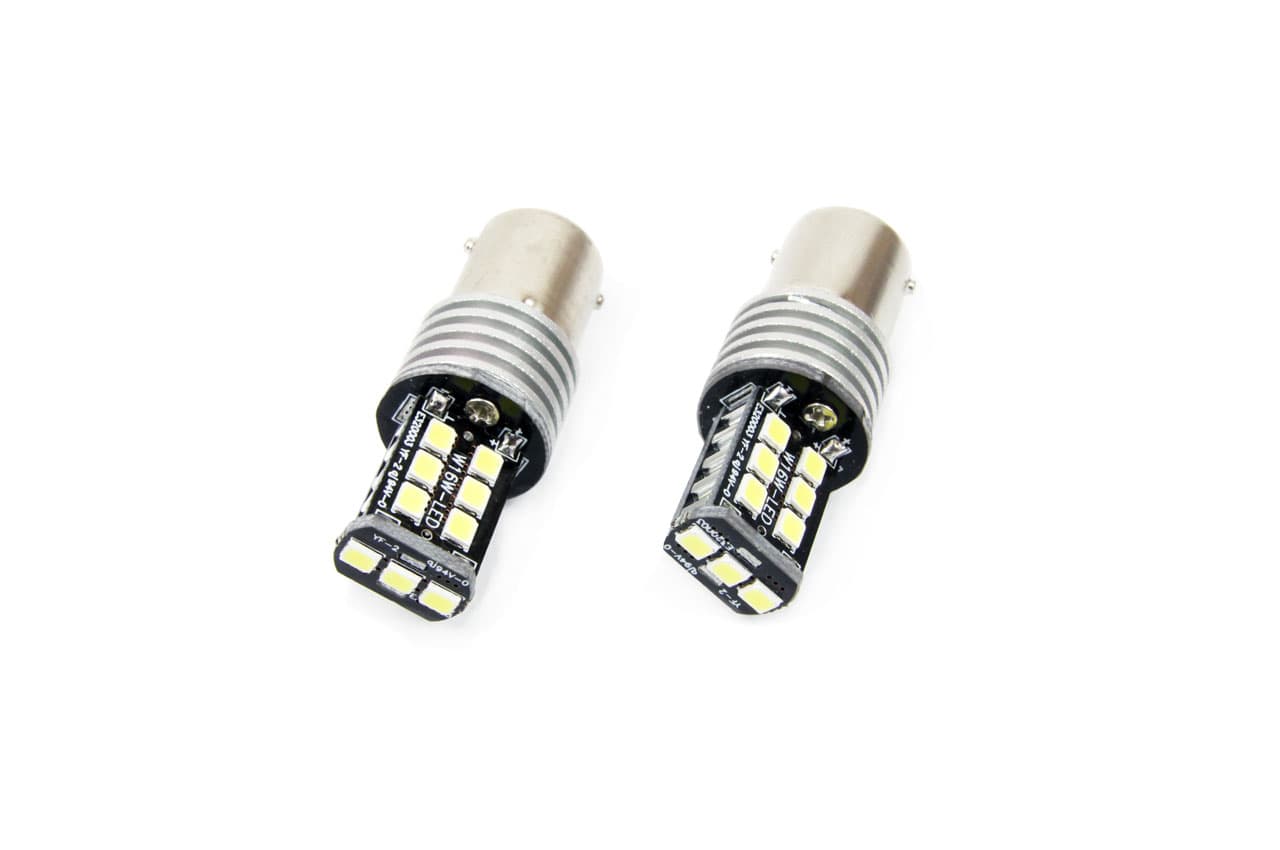 Set becuri auto LED CANBUS compatibil P21W BA15S 15 SMD 7.5W Alb 12/24V AMIO — imagine 1